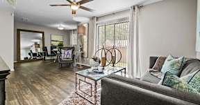 a living room with a couch and a table