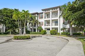 A large apartment complex with a courtyard in the middle.