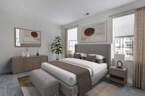 A modern bedroom with a large bed, a grey bench, and a plant.