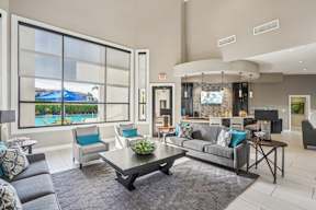 A modern living room with a pool view.