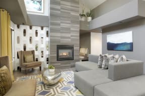 a living room with a fireplace and couches