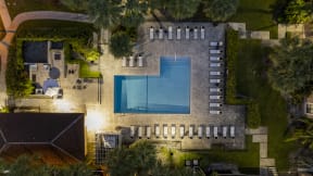 A house with a pool in the backyard.