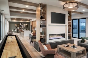 a living room with a fireplace and a television