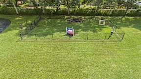 a playground with a ball in the middle of a field