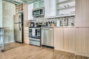 Kitchen in 1-bedroom unit with Stainless Steel Appliances