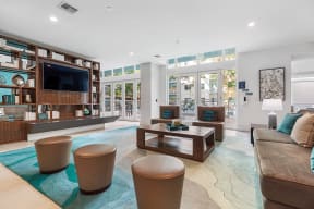 a living room with couches and a television
