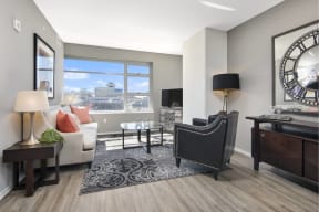 a living room with a couch and a chair