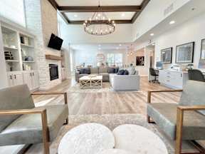 A living room with a fireplace and a couch.