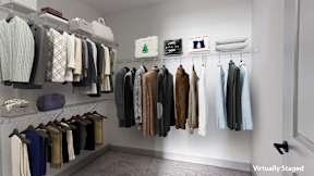 A closet full of clothes and a sign that says virtually staged.