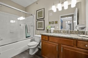 Bathroom with Large Garden-Style Tub, Glass Enclosure and Large Vanity