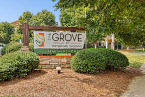 A sign for The Grove apartment homes at Waterford Crossing.