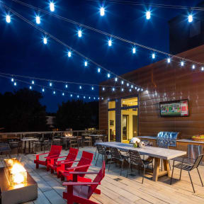 Vintage on Selby | St. Paul, MN |a patio with tables and chairs at night