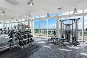 A gym with a view of the city.
