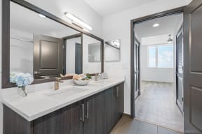 a bathroom with a sink and a mirror