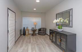 Common Area with Chair and Decor
