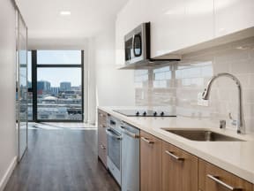modern kitchen premium appliances floor to ceiling window