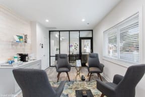 a room with a table and chairs in it at Courthouse Green Apartments, Chesterfield , VA