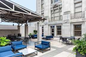 Outdoor pool area at a downtown New Orleans apartment with lounge seating
