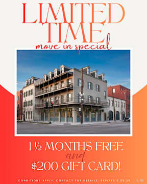 A building with a sign offering free move in special for 1 and a half months.