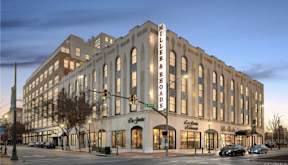 A large building with a sign that says "Miller & Beards" on it.