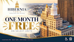 An advertisement for a one month free offer on select units at the Hibernia Tower in New Orleans.