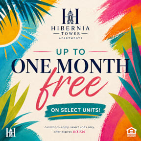 A poster advertises one month free on select units at Hibernia Tower Apartments.