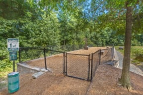 our apartments showcase a dog park with kennels