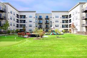 Courtyard with putting green and playground at Arden of Oak Brook Apartments, Oakbrook Terrace, 60181