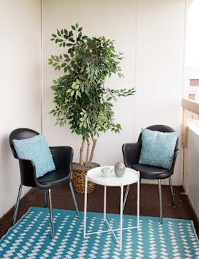Balcony with outdoor seating arrangements  at Hampton Plaza Apartments, Towson, Maryland