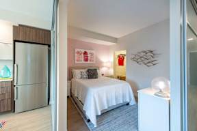 Bedroom with bed, closet and bathroom at Artline Apartments, Washington