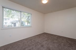 Fernwood | 1x1 Bedroom with natural light and wall to wall carpet