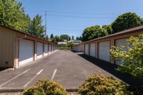 a long row of garages on the side of a building