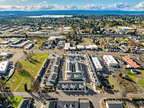 An aerial bird's eye view of Terra Lofts with views of the Columbia River and Downtown Vancouver