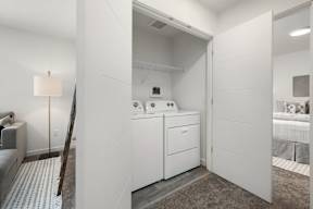 A laundry room with a washer and dryer.