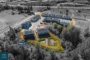 An aerial view of a housing development in Phase 3.