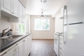 The Crossings| Kitchen with White Cabinets