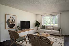 A living room with a television, a couch, a chair, and a potted plant.