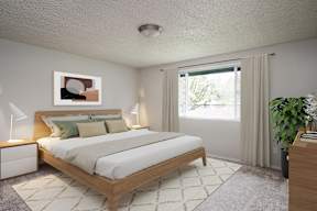 A bedroom with a large bed and a painting on the wall.