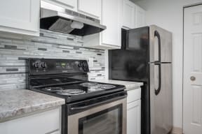 Riverwood | Kitchen Stove and Fridge