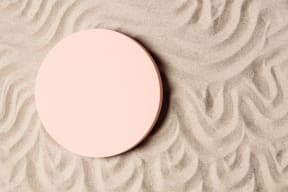 Pink mirror sitting on the sand  at Sono Central Residential, Connecticut