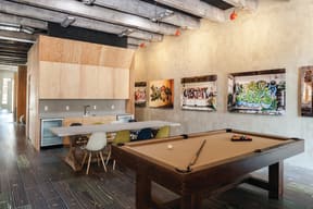 a game room with a pool table and a ping pong table  at Iron Works Sono, Norwalk