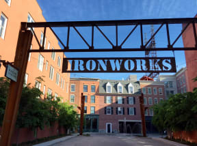 a sign that reads ironworks in front of a building  at Iron Works Sono, Norwalk
