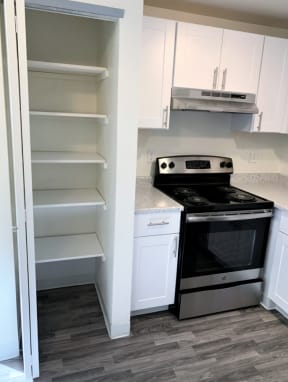 Kitchen with Stainless Steel Appliances - Apartments in Steilacoom