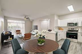 Dining room looking onto living room and kitchen