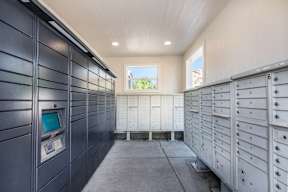A row of mailboxes are lined up on either side of a hallway.
