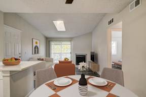 Dining room and living room with fire place