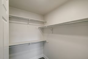 a spacious walk in closet at the historic electric building in fort worth, tx