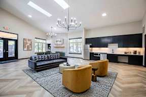 a living room with a couch and a table