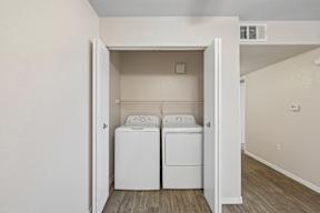 A laundry room with a washer and dryer.