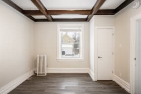A bedroom at 117 Bryce Suites for rent in Winnipeg